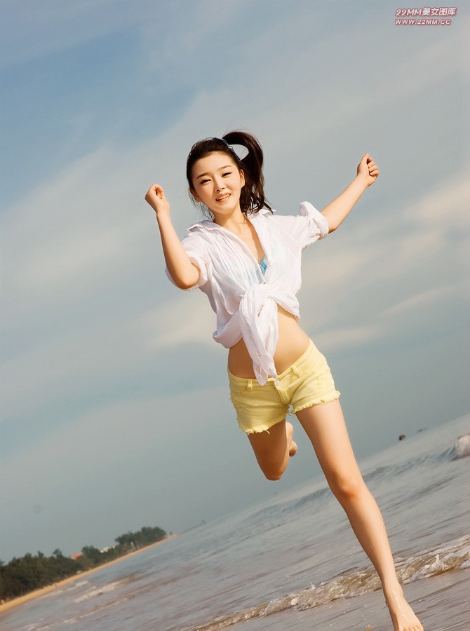 Cute Chinese girl, sexy on the beach.