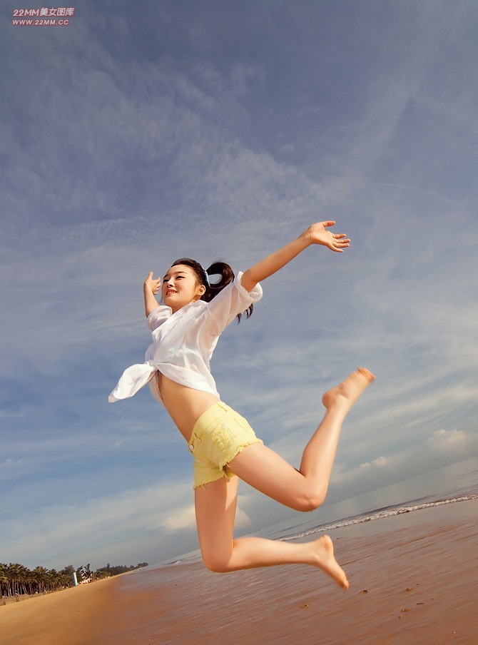 Cute Chinese girl, sexy on the beach.