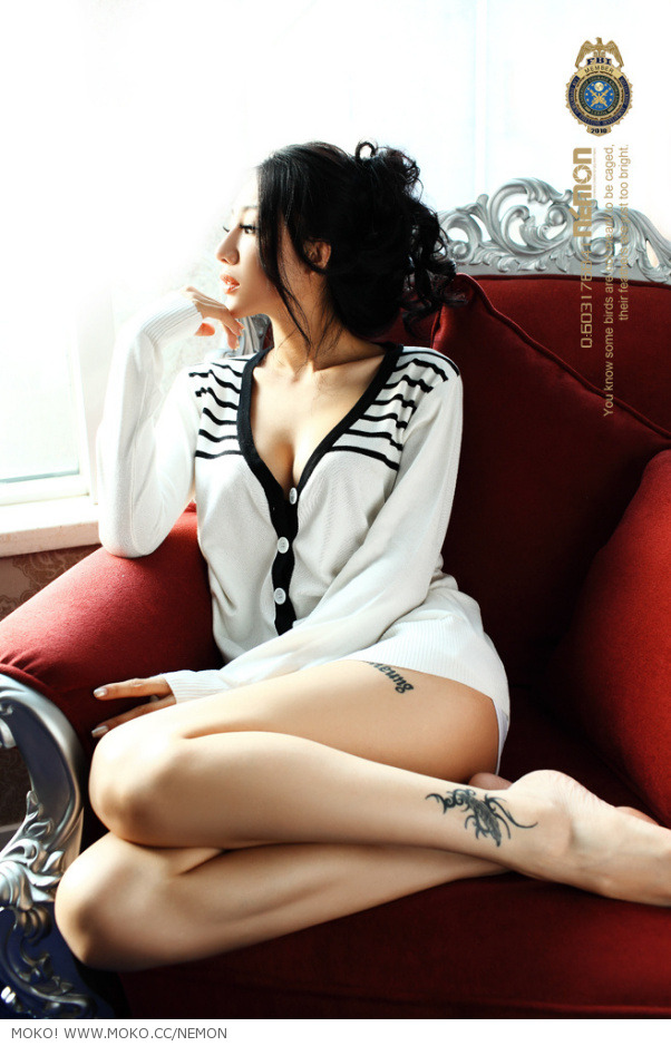Jin Mei Xin My Angel lady Sexy with cute tattoo on her left leg.