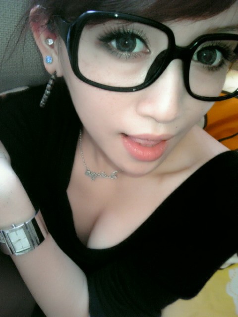 Pretty girl with glasses.