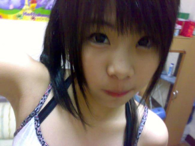 Sexy Asian girl take her self photo with sexy style