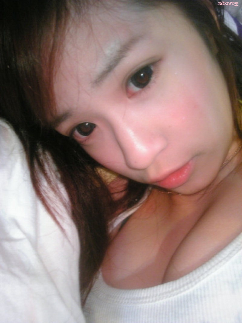 Asian lady sexy in her self.