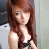 Beautiful Asian lady. Sexy with black underware. She has big eyes.