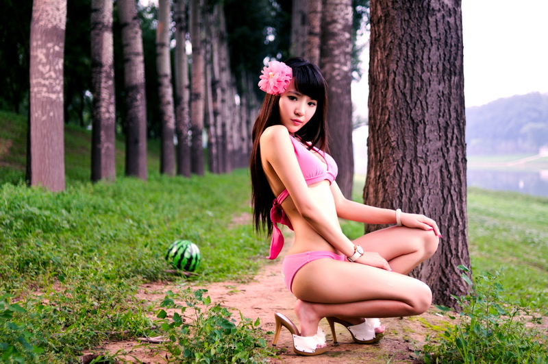 Sexy Asian lady in pink bikini, so cute and very perfect
