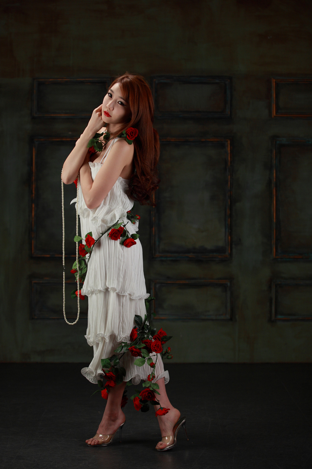 Go Jung Ah Korean lady in white maxi and red roses.