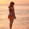 Xiaoyi Liang Yi Chinese Lady Present Beauty Colorful Dress on the Beach